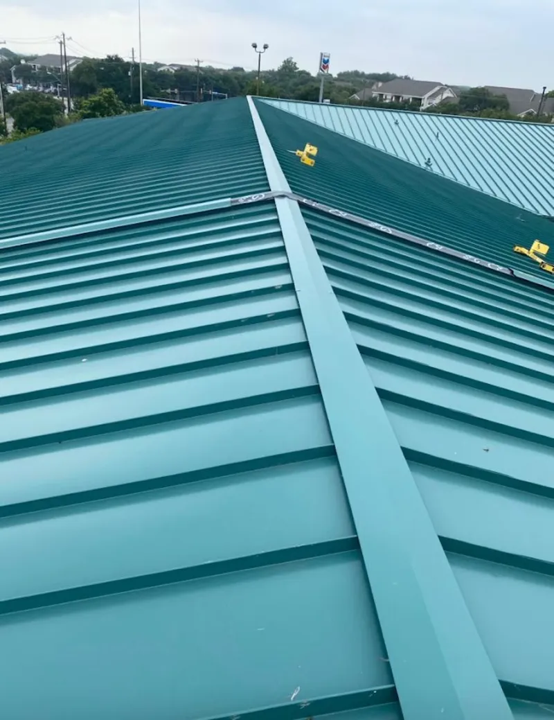 Green commercial metal roof ridge and valley for Metal Roof Repair in Rancho Cucamonga